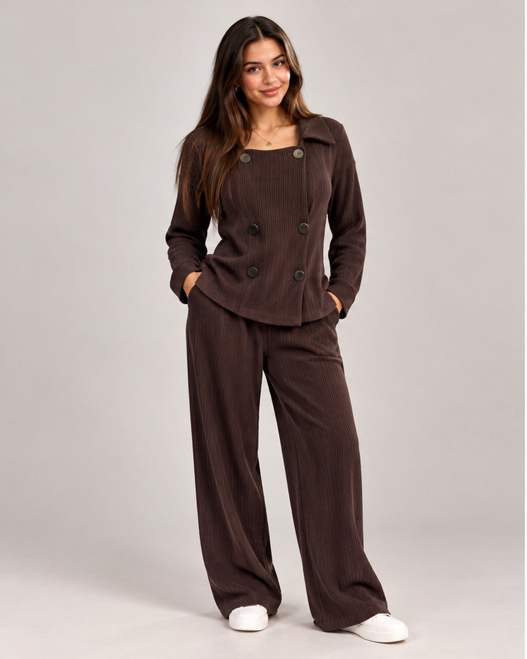 Two-piece set featuring a long-sleeve, double-breasted top with 6 buttons and wide-leg trousere