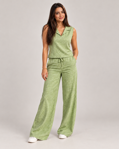 Sleeveless linen  set styled with  metallic gold  buttons